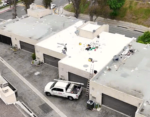 Commercial building with rooftop work